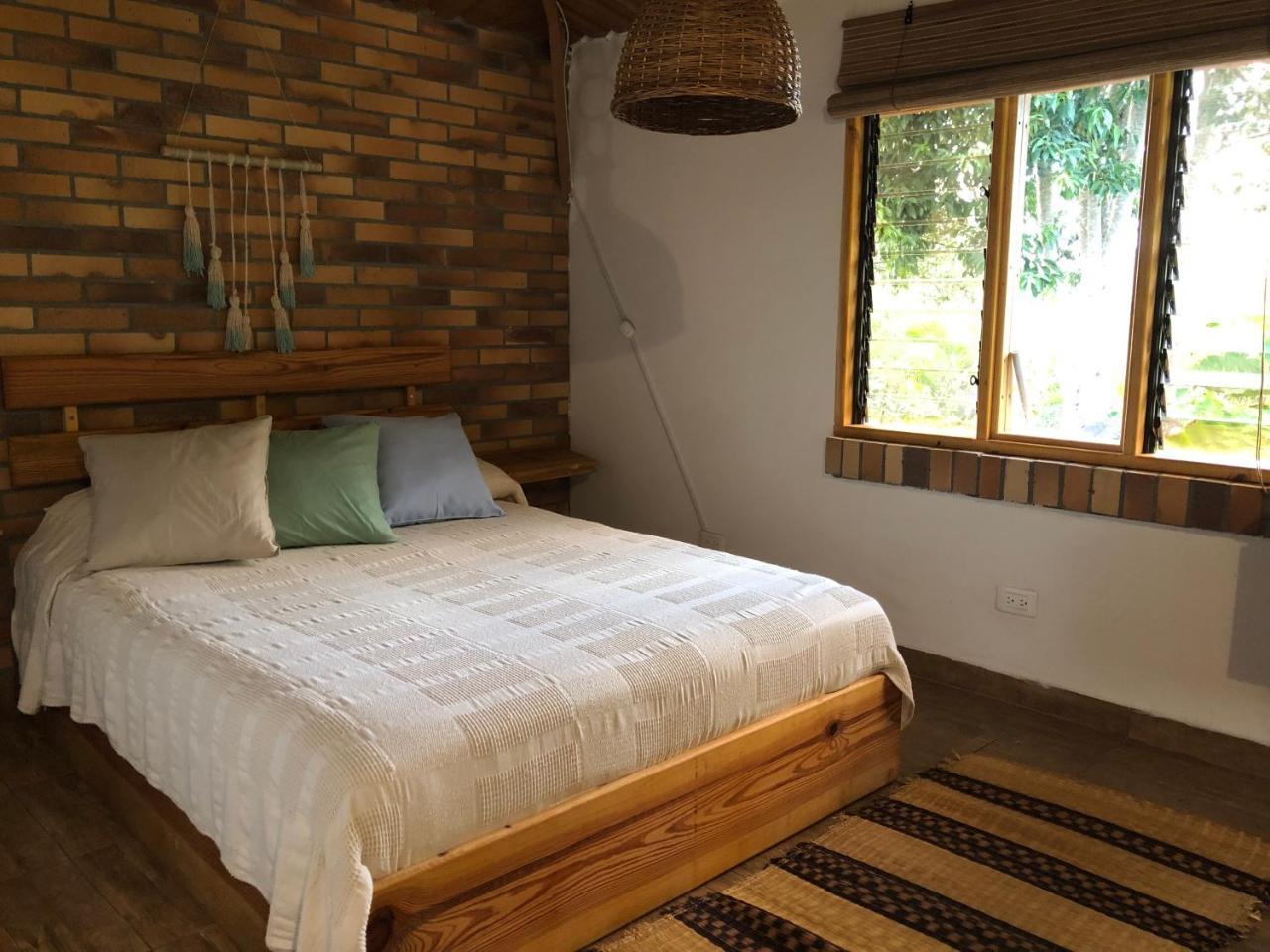 Tribu Ecohostal 洛斯桑托斯 外观 照片